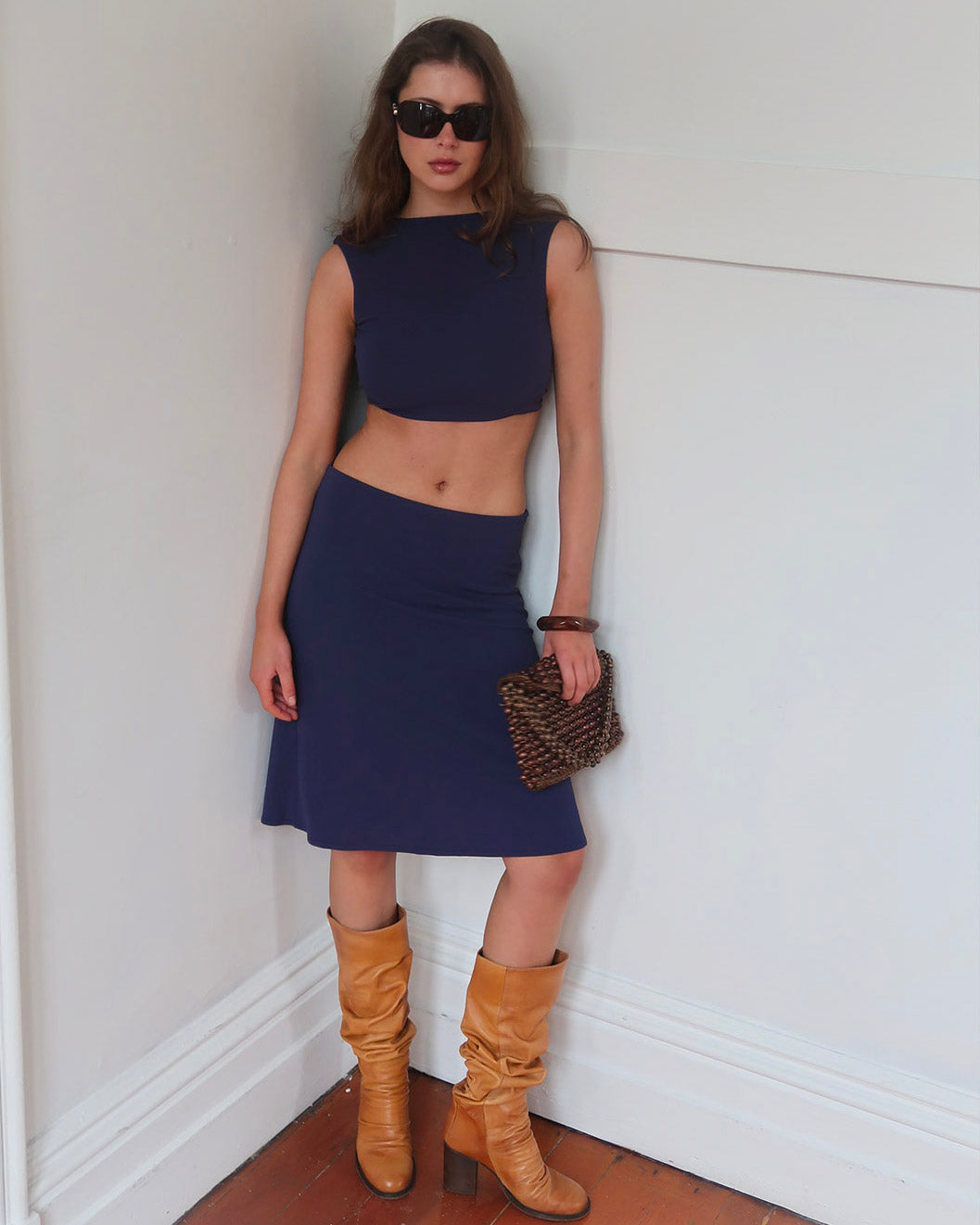 Mia Cropped top versatile featuring a front tie and plunge neck line