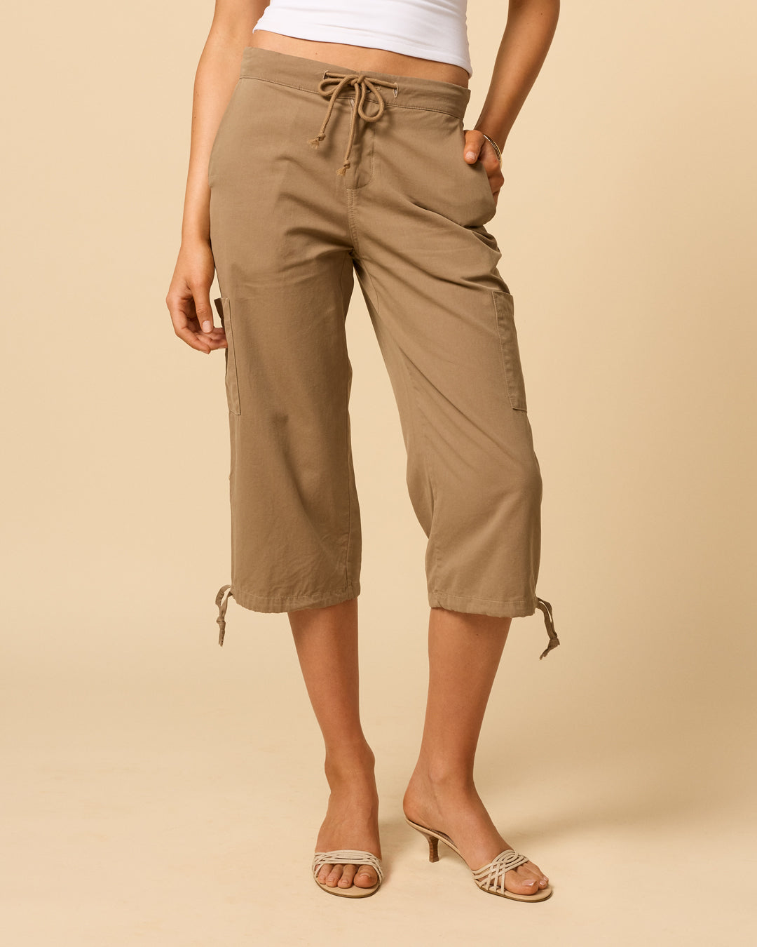 Low waisted cargo pants for woman with adjustable tie hem