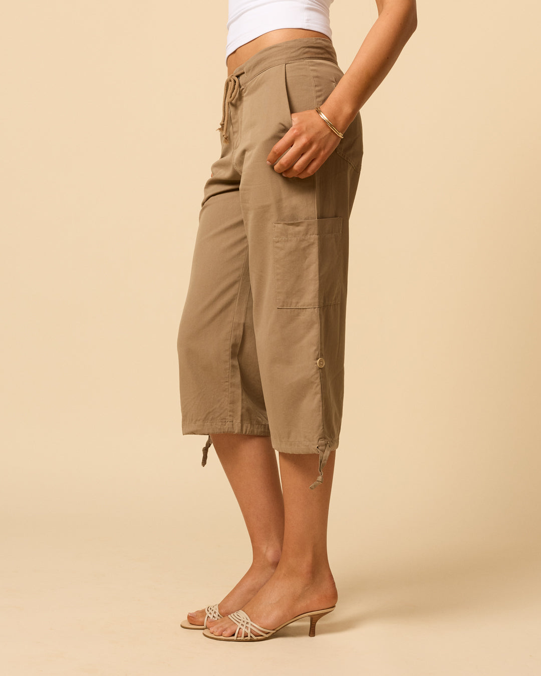 Low waisted cargo pants for woman with adjustable tie hem