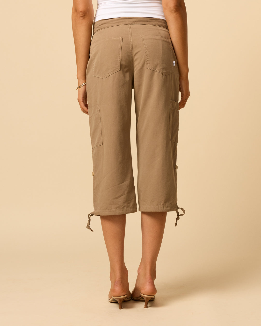 Low waisted cargo pants for woman with adjustable tie hem