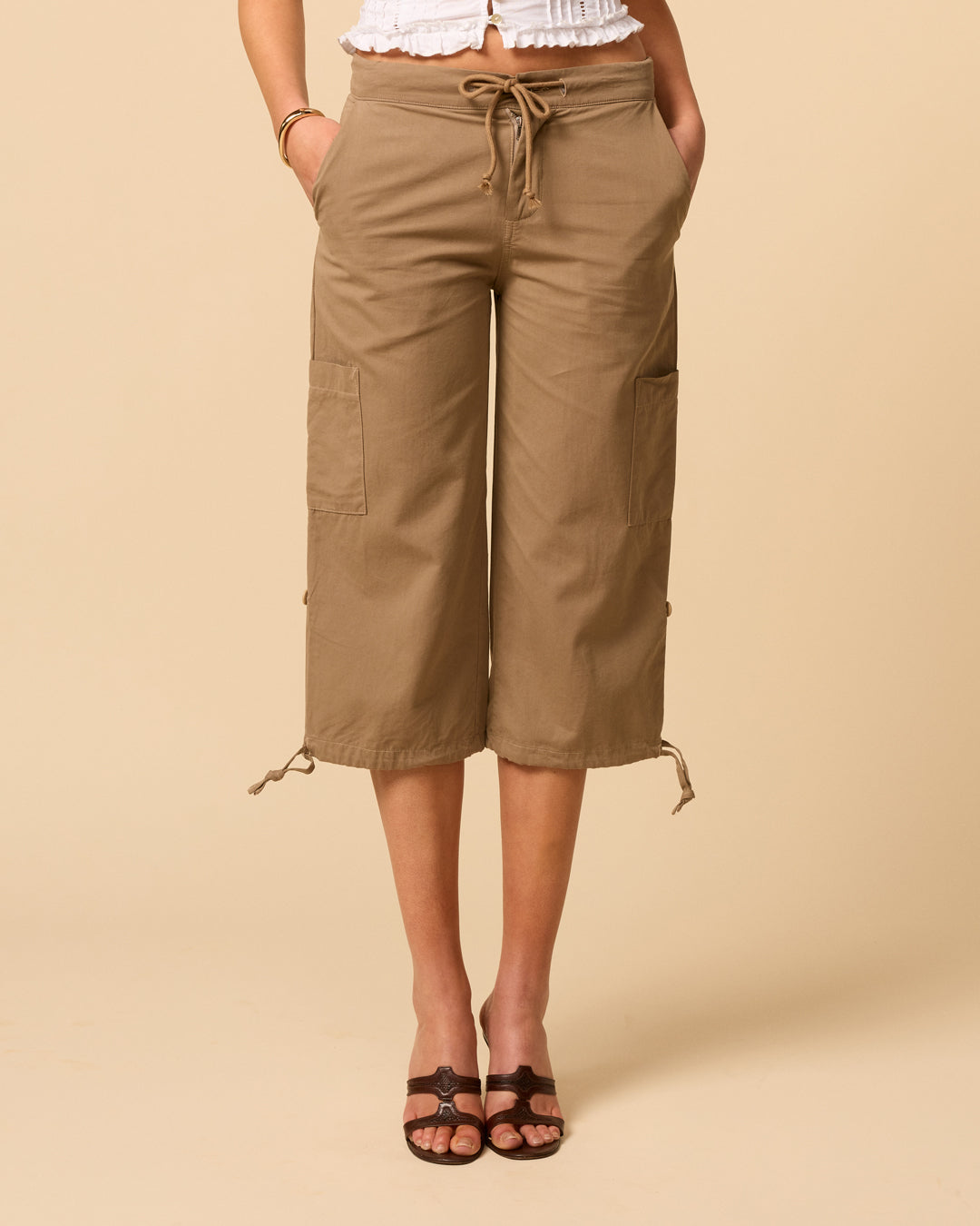 Low waisted cargo pants for woman with adjustable tie hem