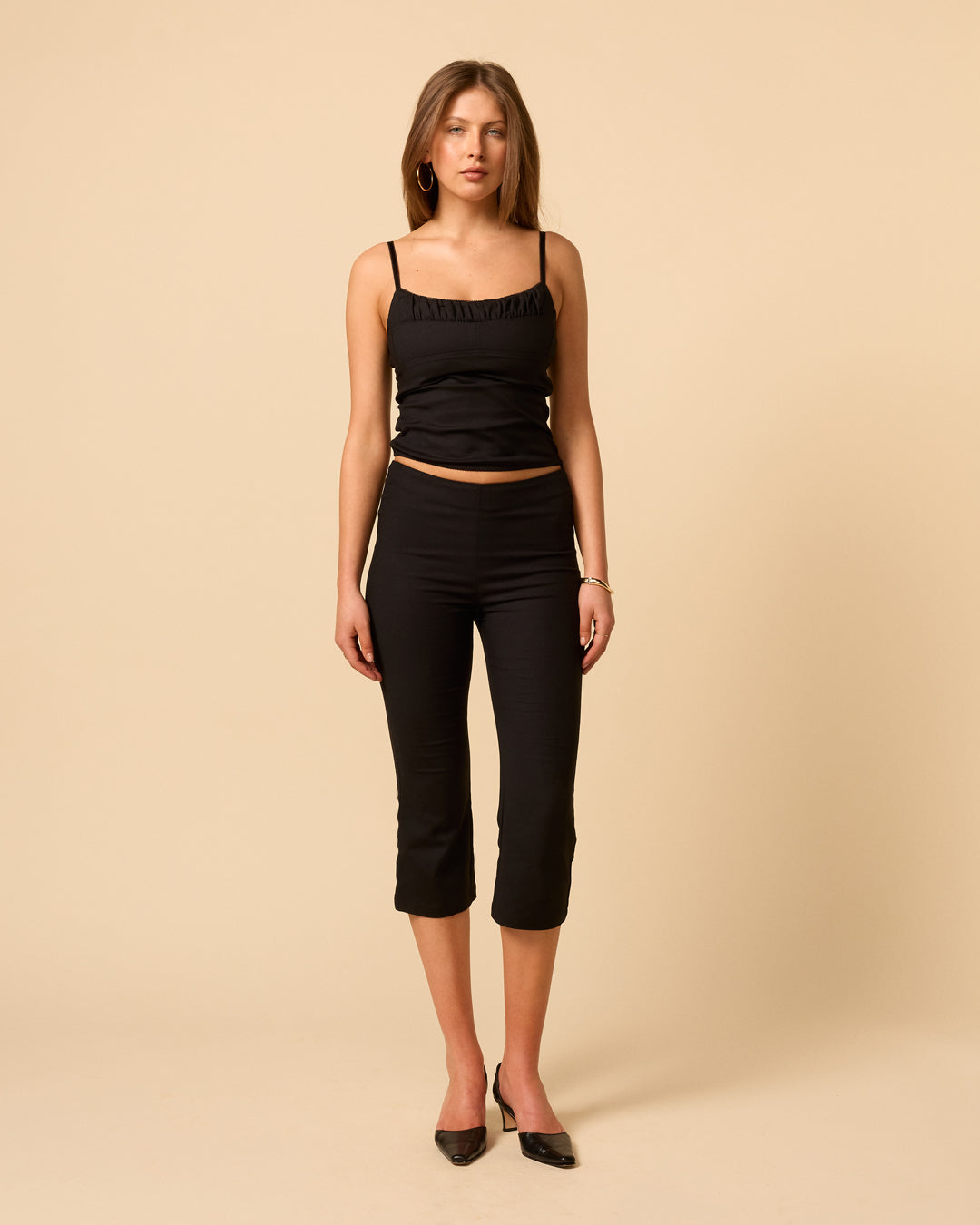Marie Capri in black a mid rise cropped pants by VDM The Label