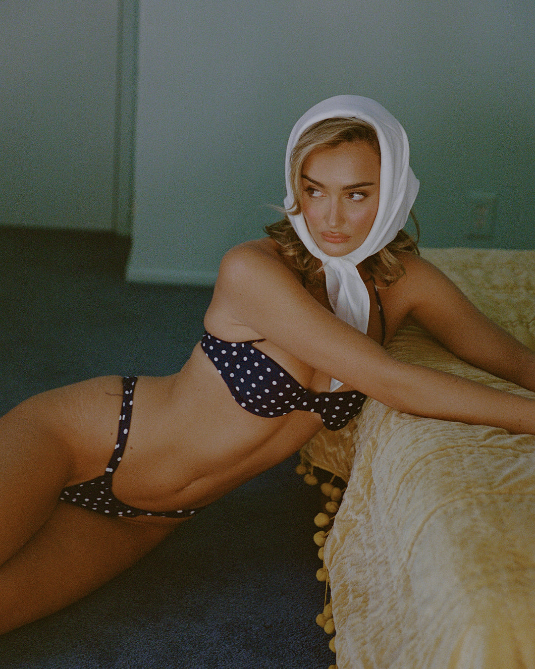 India reversible underwire bikini in navy polka dot with matte navy reverse, designed with removable halter straps and a tie-back for flexible wear.