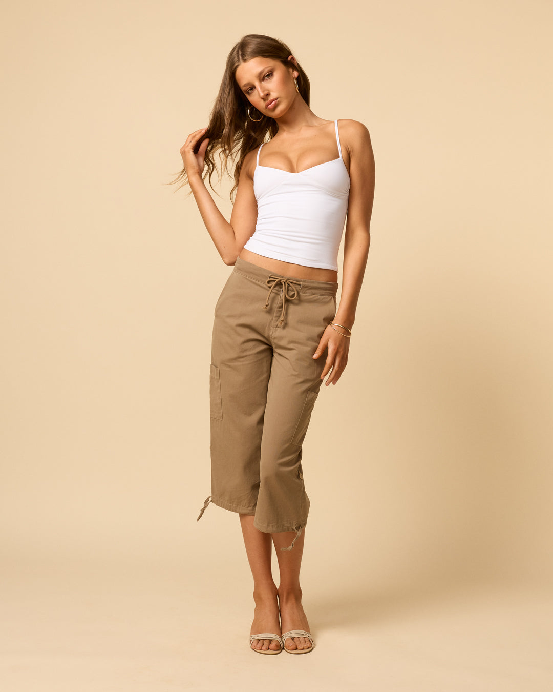 Women's white singlet with sweetheart neckline and countoured waist